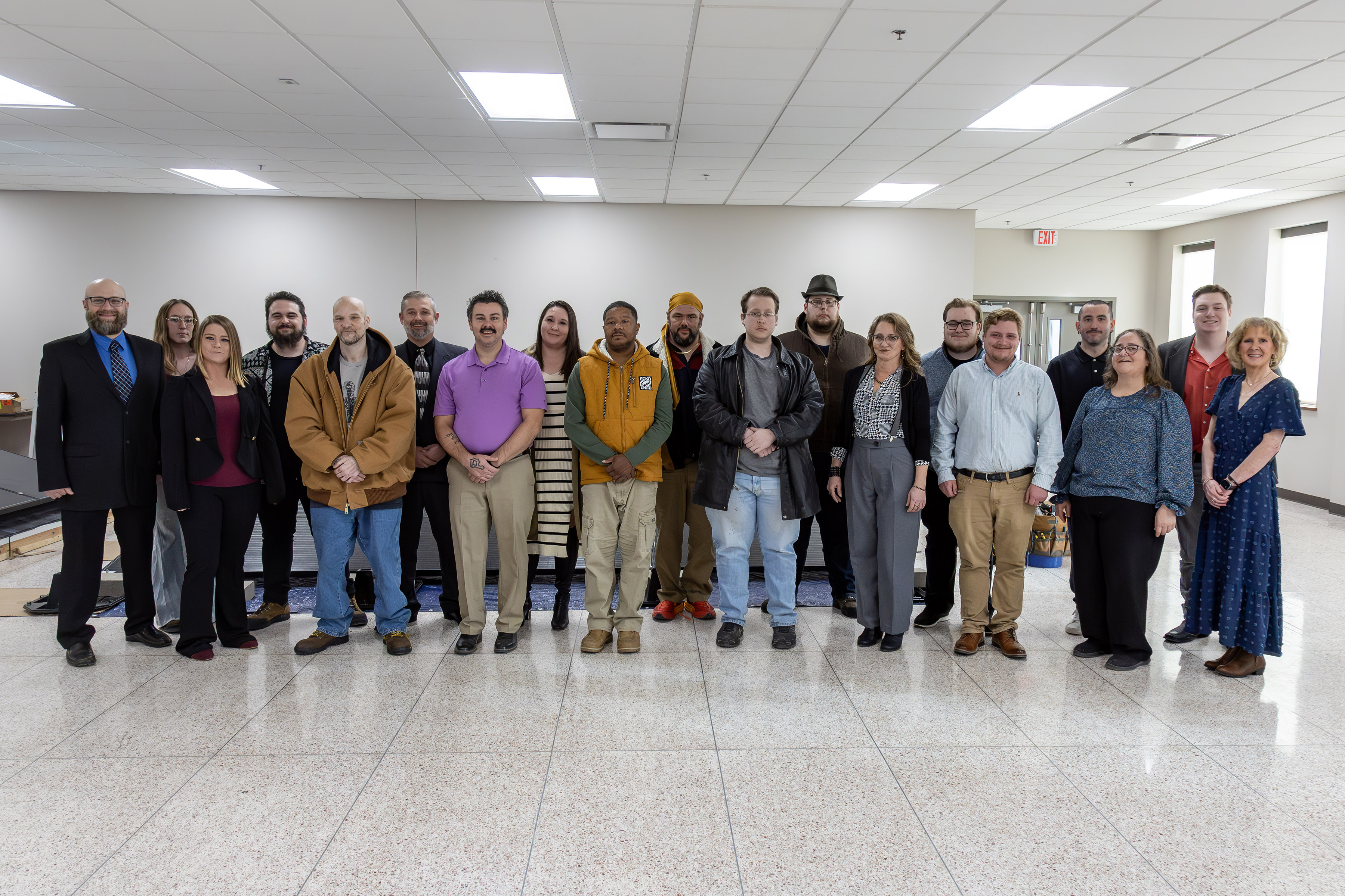 Sixteen students earned their certificates through the Climate and Equity Jobs Act (CEJA), which prepares them for clean energy careers. In the front row, from left to right, are Solar Photovoltaic Instructor Kyle Barber, Taryn Sensmeyer, Chris Lamere, Nick Pontello, Romeral Curtis, Matthew Purkaple, Brooke Bennett, Cameron Tyler Bartram, CEJA Transition and Support Coordinator Julie Jobryce and Clean Energy Instructor Jen Gibson. In the back row, from left to right, are Heather Lucas, Nelson Lucas, Brandon Schowengerdt, Ketra Kennedy, Jesse Brown, Jarrett Purkaple, Gage Martin, Spenser Hughes and Aiden Davis. Photo by Jan Dona, L&C Marketing/PR.