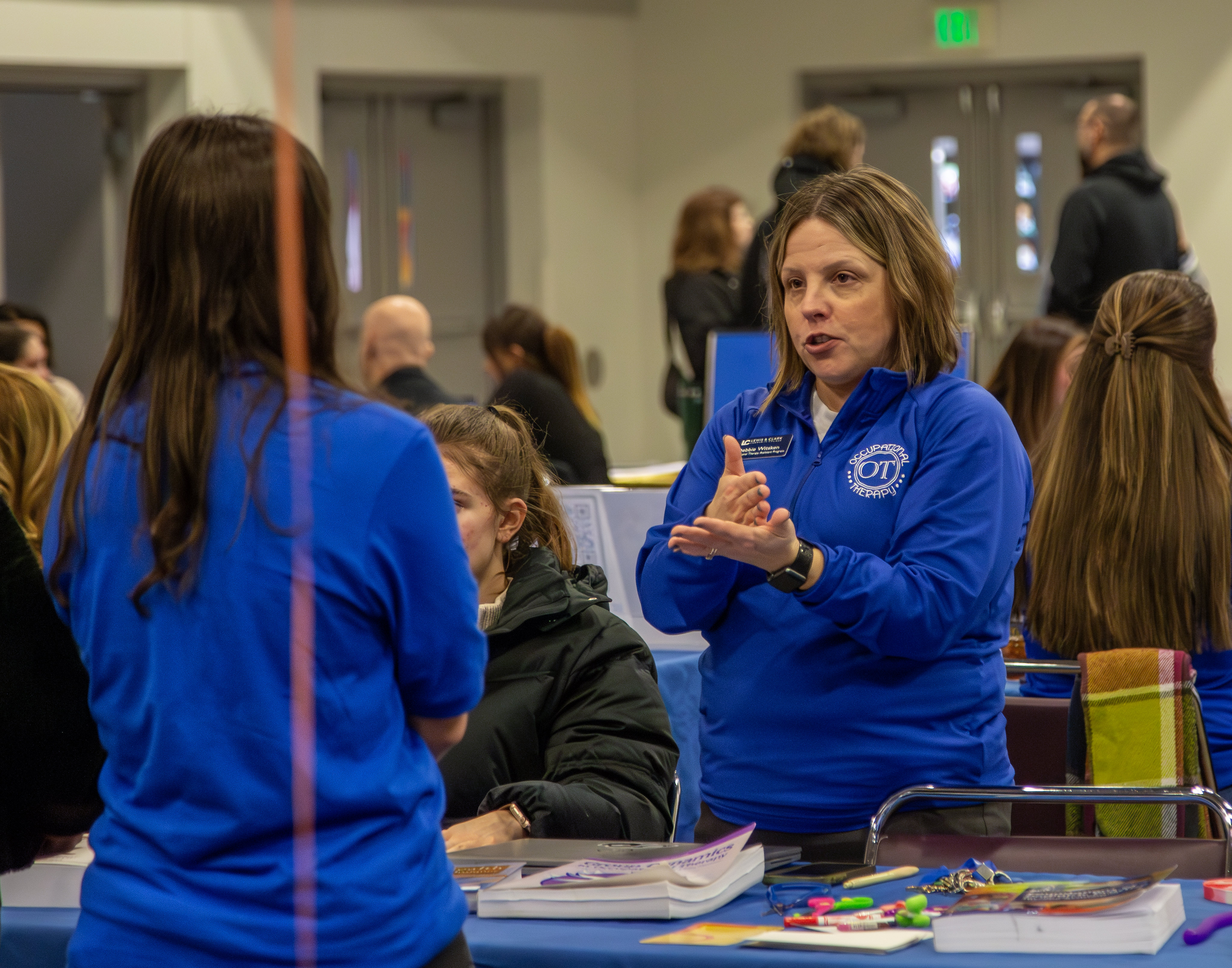 Occupational Therapy Assistant Coordinator Debbie Witsken speaks to a prospective student about the program during the Spring 2025 Discover Day. Photo by IRENE RUIZ-GONZALEZ/LC Marketing & PR