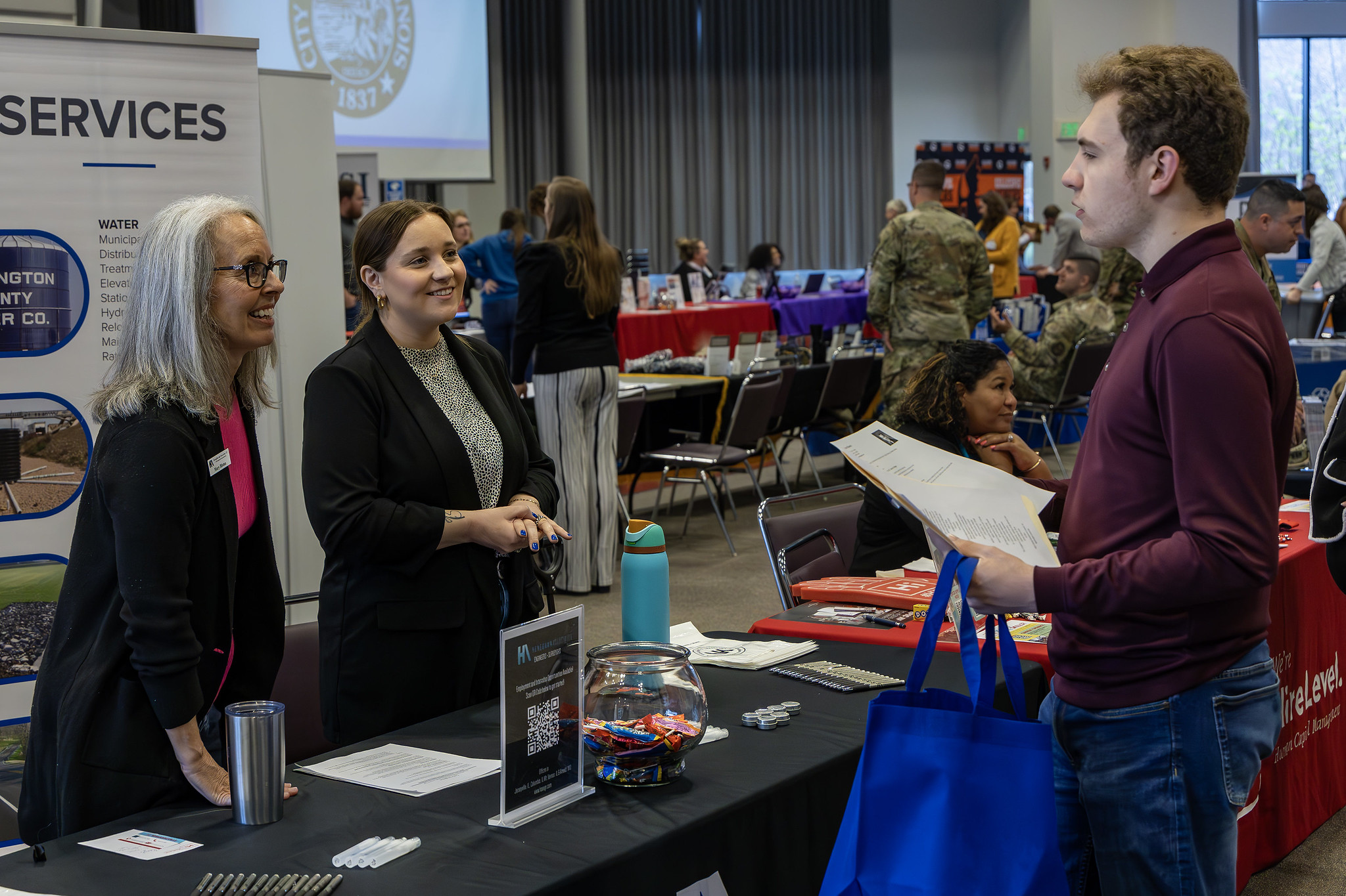 A job seeker interacts with an employer during the 2024 Job Fair at Lewis and Clark Community College. 