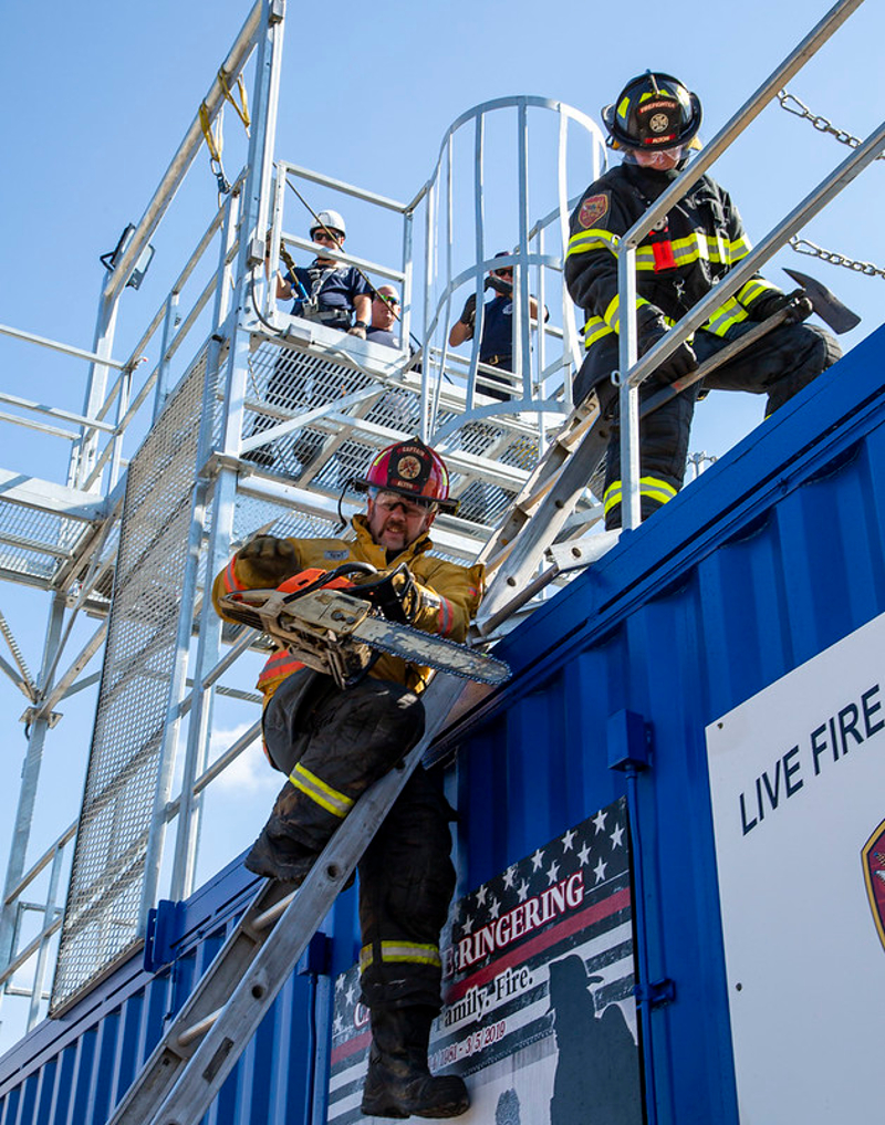 Local firefighters perform a demonstration on The Jake, L&C’s Fire Science Training unit. Photo by JAN DONA/L&C MARKETING & PR