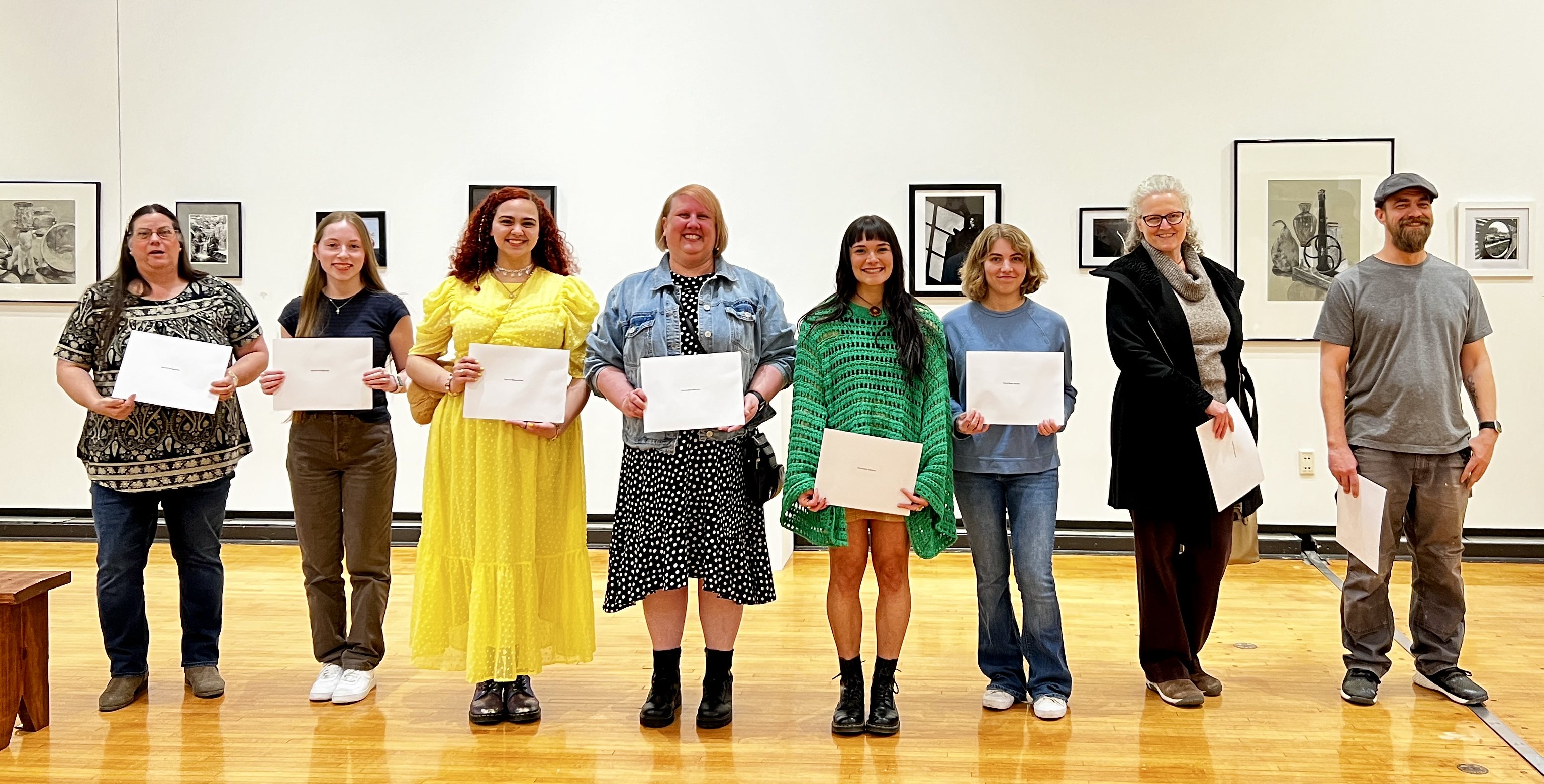 Pictured from left to right are the winners of the 2023 L&C Student Art Exhibition: Kayla Rudolph, Laura Perry, Mary Curvey, Madison Baca, Jeannette Carrington, Ryan Kuhn, Grace Becker, Laura Shansey and Daniel McDonald. NATHAN WOODSIDE/L&C MARKETING & PR