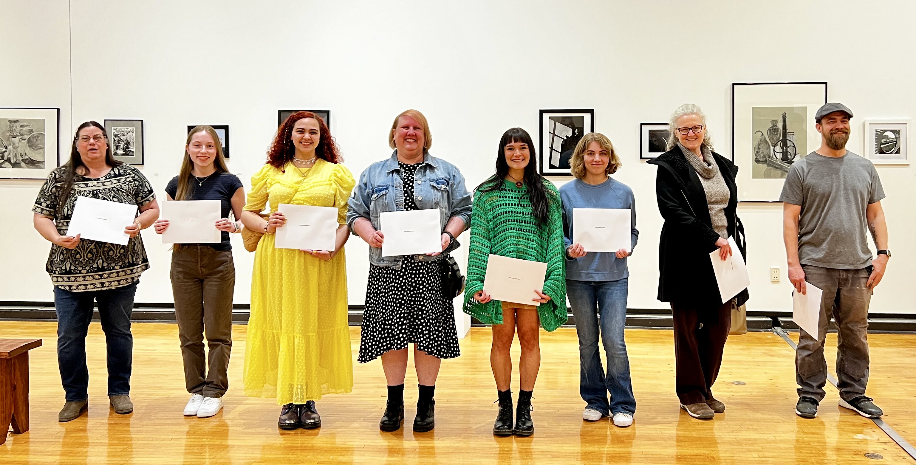 Pictured from left to right are the winners of the 2023 L&C Student Art Exhibition: Kayla Rudolph, Laura Perry, Mary Curvey, Madison Baca, Jeannette Carrington, Ryan Kuhn, Grace Becker, Laura Shansey and Daniel McDonald. NATHAN WOODSIDE/L&C MARKETING & PR