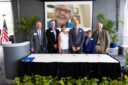 At a ceremony held Friday, May 19, at Lewis and Clark Community College, documents were signed to establish endowments for mental health services at the college. In attendance were nearly 100 family, friends and colleagues of the honorees, Dr. Sonjia and Don Peacock. Pictured from left: College Foundation Board President Rob Schwartz, Jay and Melanie Culver, Sonjia Peacock (via Zoom), College President, Dr. Ken Trzaska, Dr. Linda Chapman and Foundation Executive Director, Dr. Dale Chapman, Photo by ALAN SHAWGO/Route 3 Films