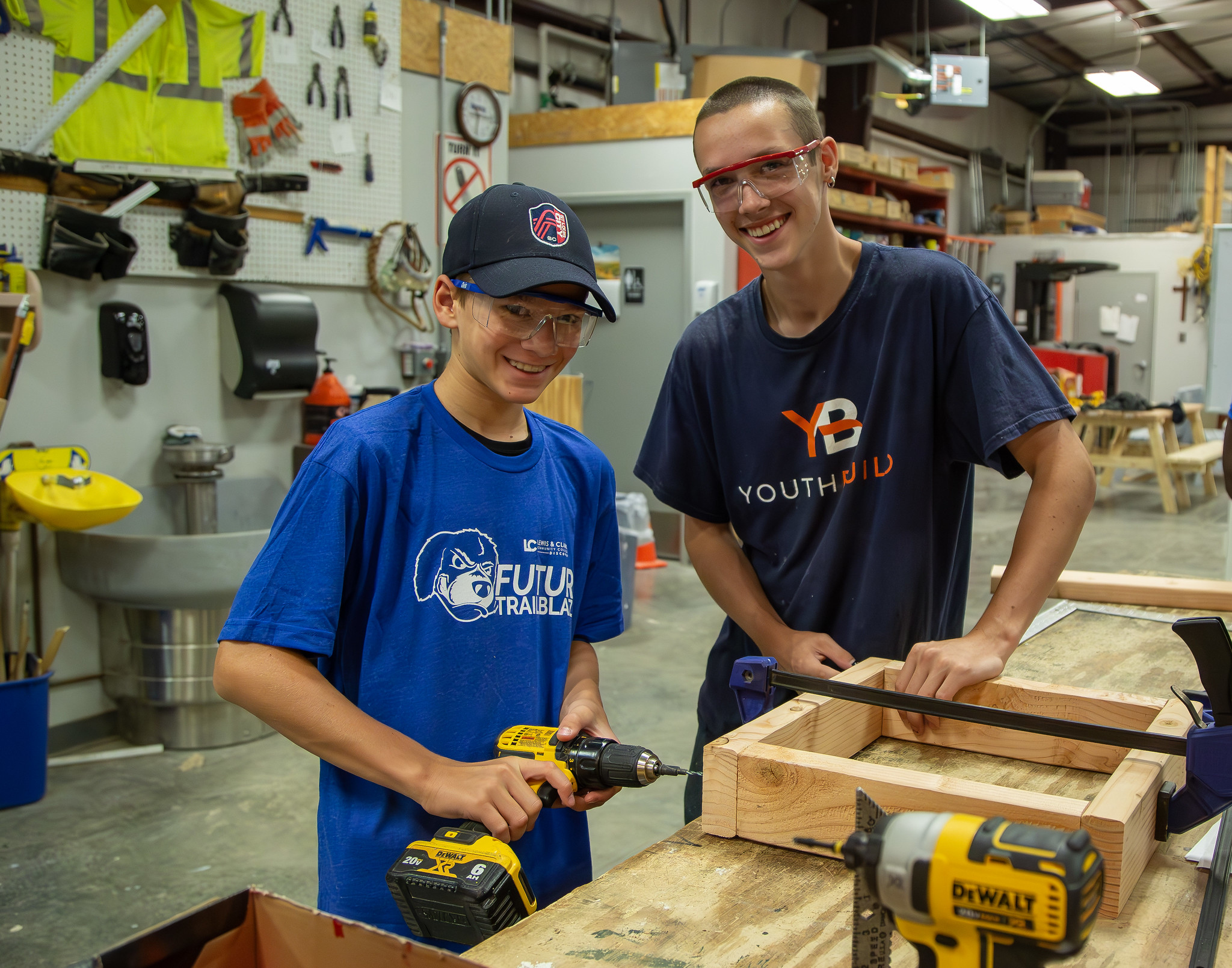 Camper Oscar Crockett, left, works with YouthBuild AmeriCorps student Vaughn Kuykendall to build a washers set during Construction Camp at L&C’s Scott Bibb Center. Photo by JAN DONA/L&C MARKETING & PR