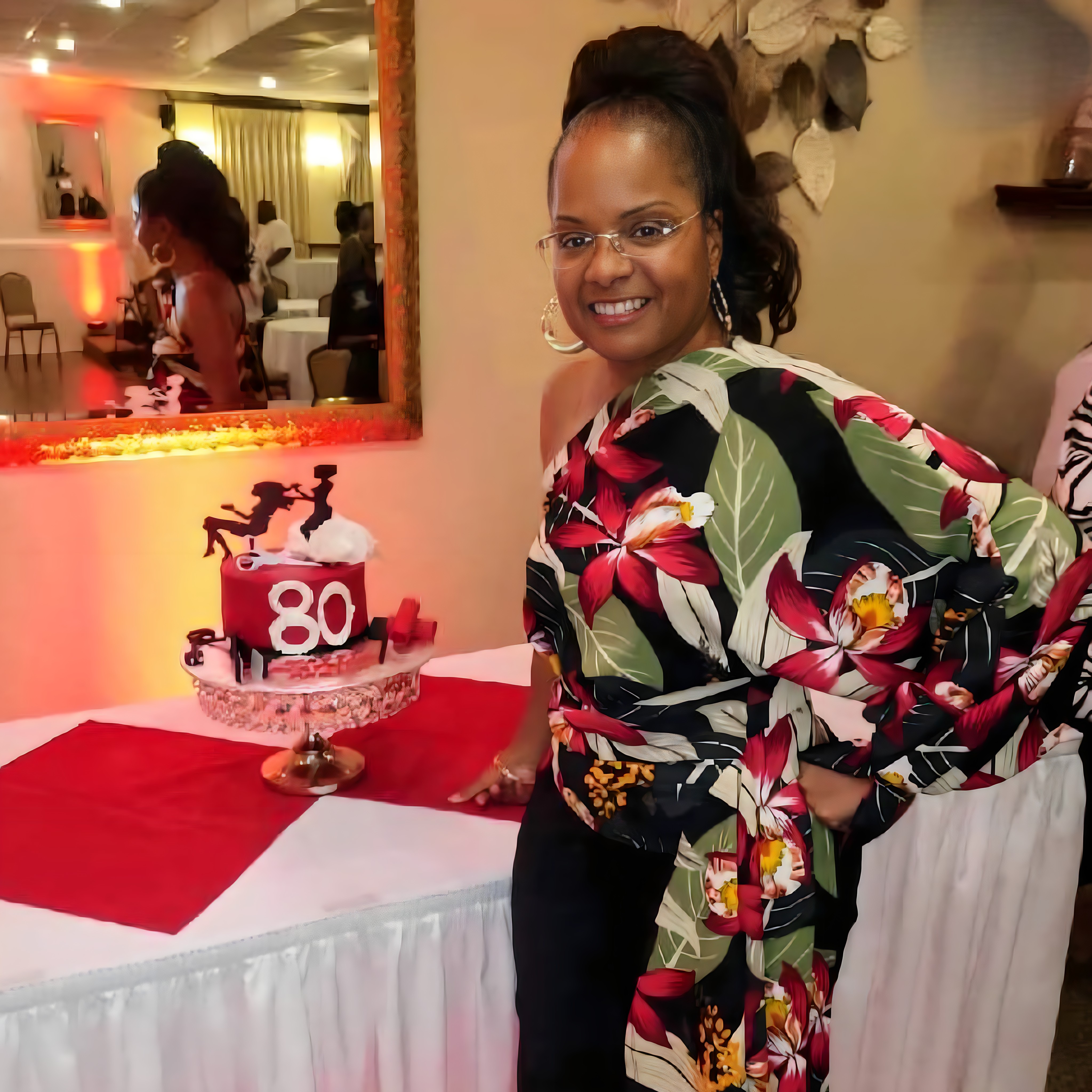 Carla Soll, of Anointed Cake Creations, poses with one of her cakes. Submitted Photo.