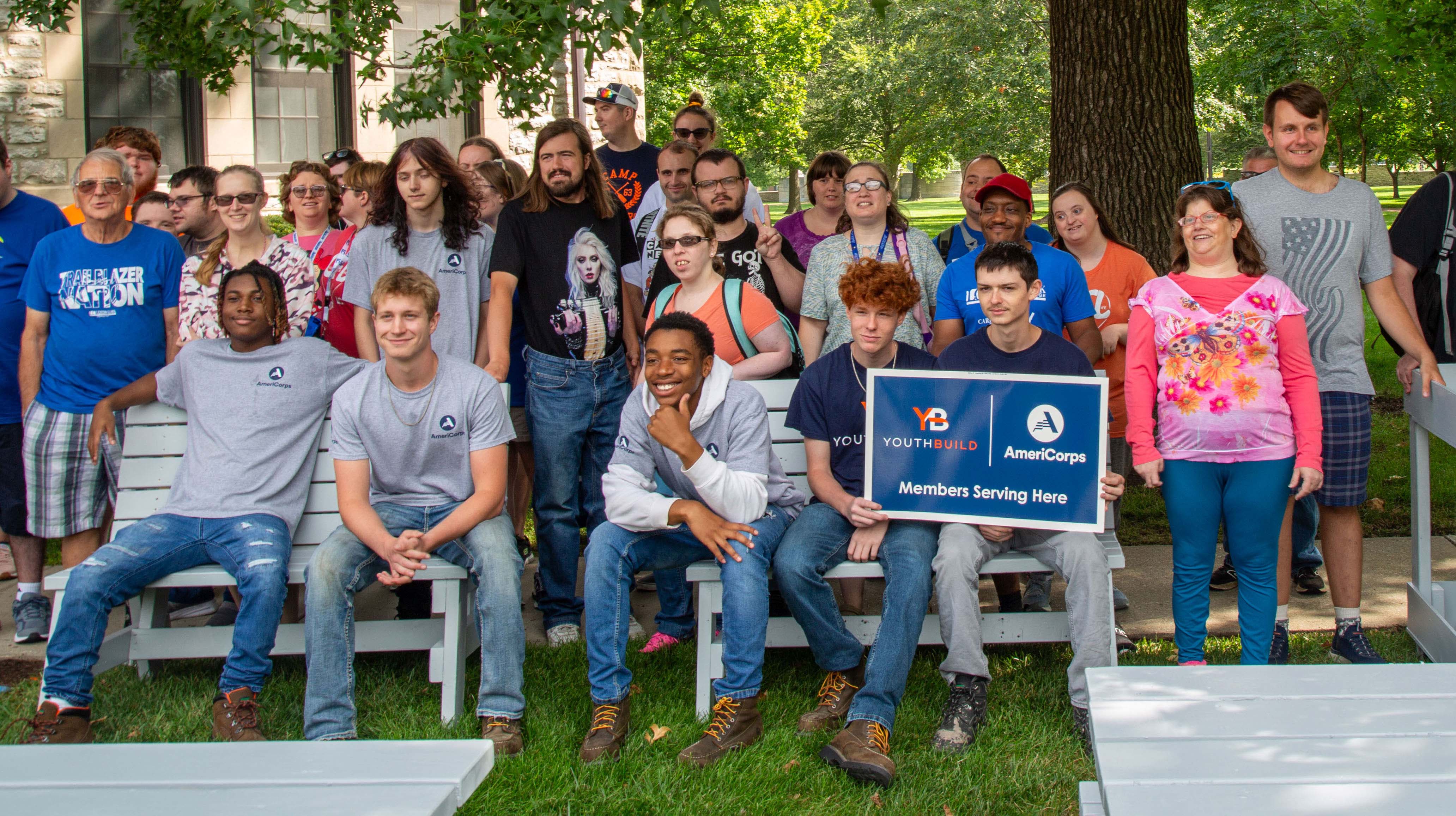 L&C’s College for Life students with YouthBuild AmeriCorps show off the new wheelchair-accessible seating outside Fobes Hall. JARED SMILACK/L&C Marketing & PR