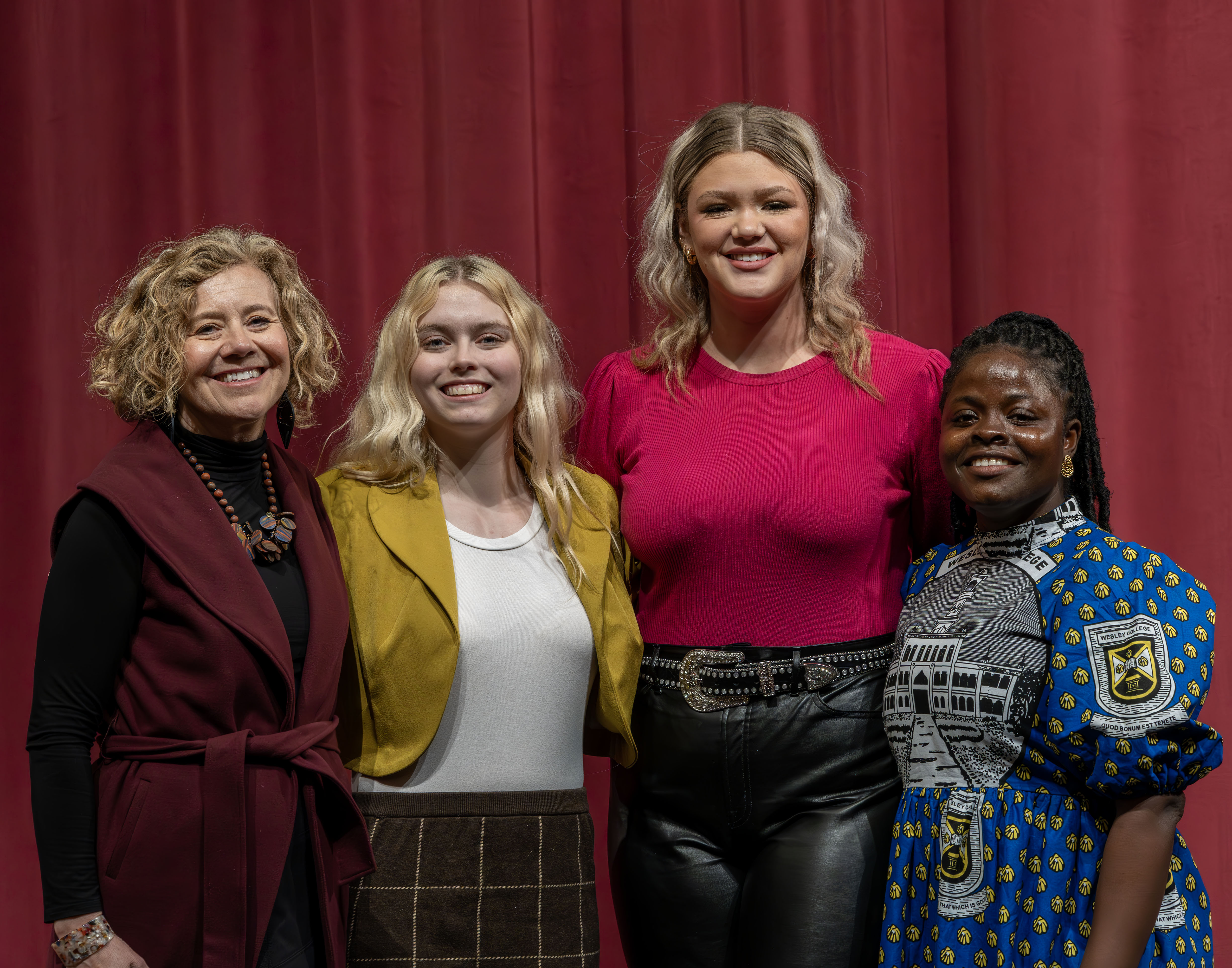 PTK Sponsor and Speech Professor Elizabeth Grant (left) with “You Have a Voice!” winner, Belle Blackorby; second-place finisher, Madeline Bouillon and third-place contestant, T.K. Queenster. James Pepper, L&C Marketing/PR.