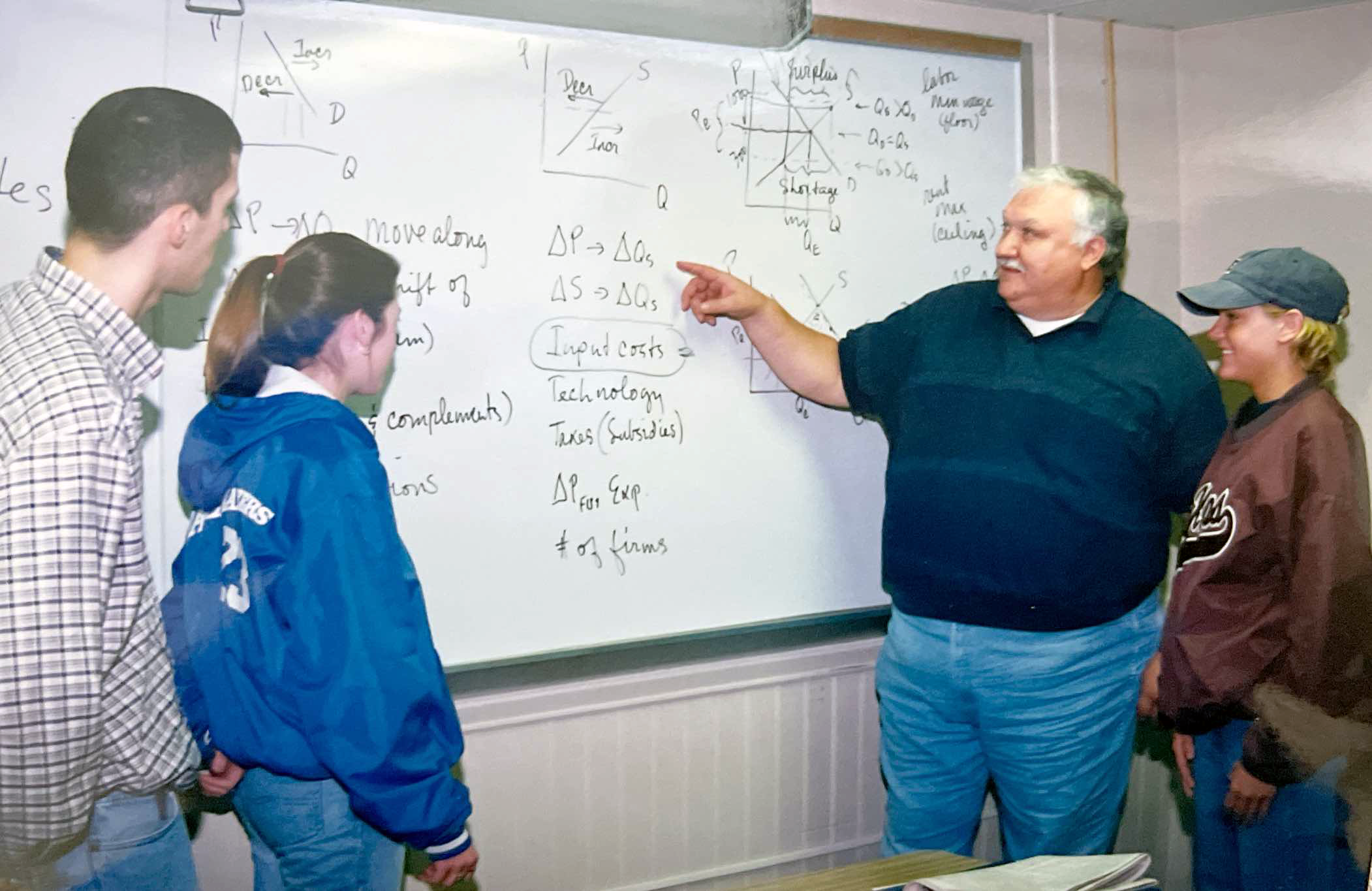 Bob DiPaolo is pictured in his classroom with students. LC file photo