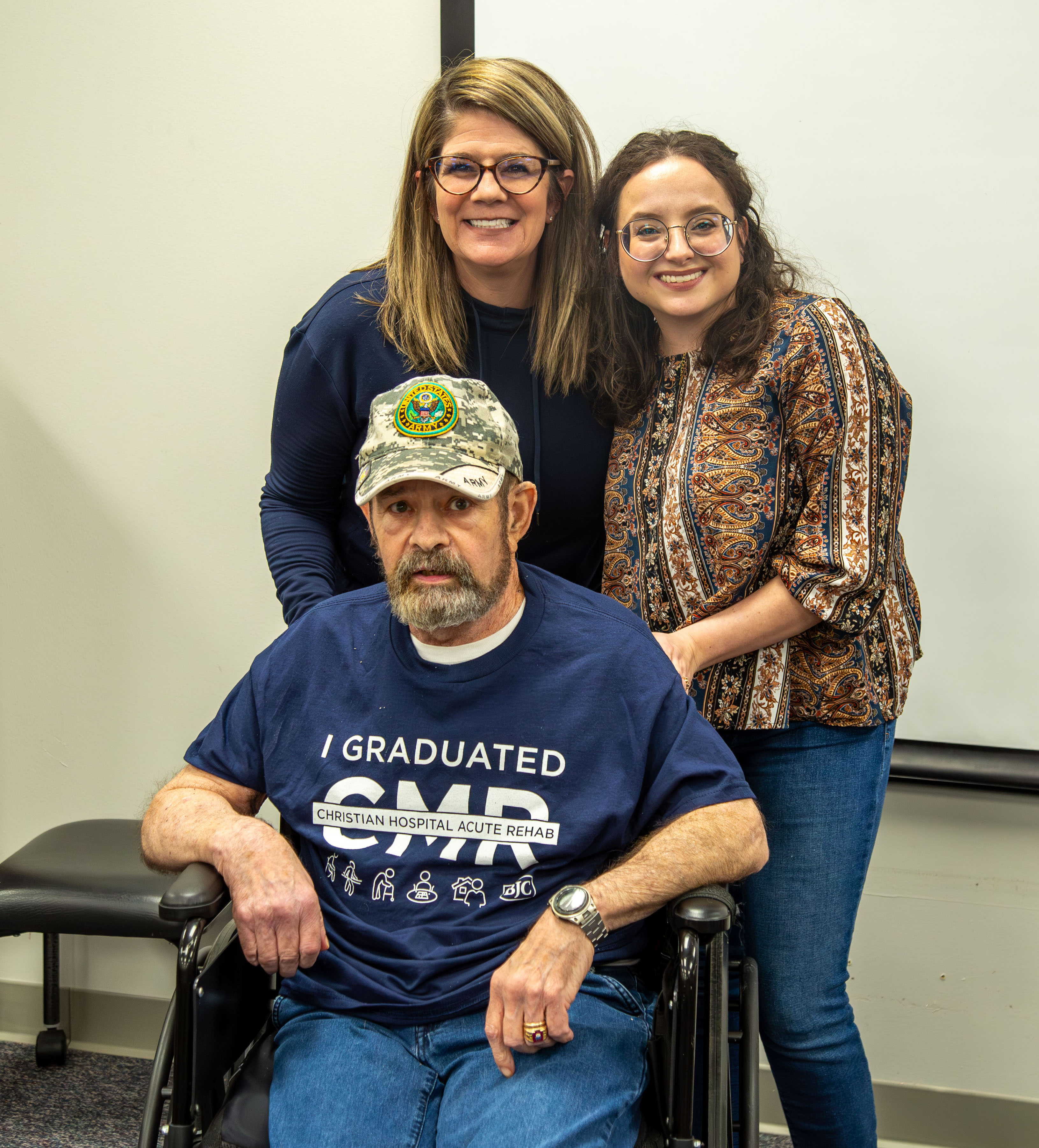 OTA Alumna Amy Jun, her father William ‘Buzz’ Smith and occupational therapist Breanne Edwards. PHOTO BY JARED SMILACK/L&C MARKETING & PR