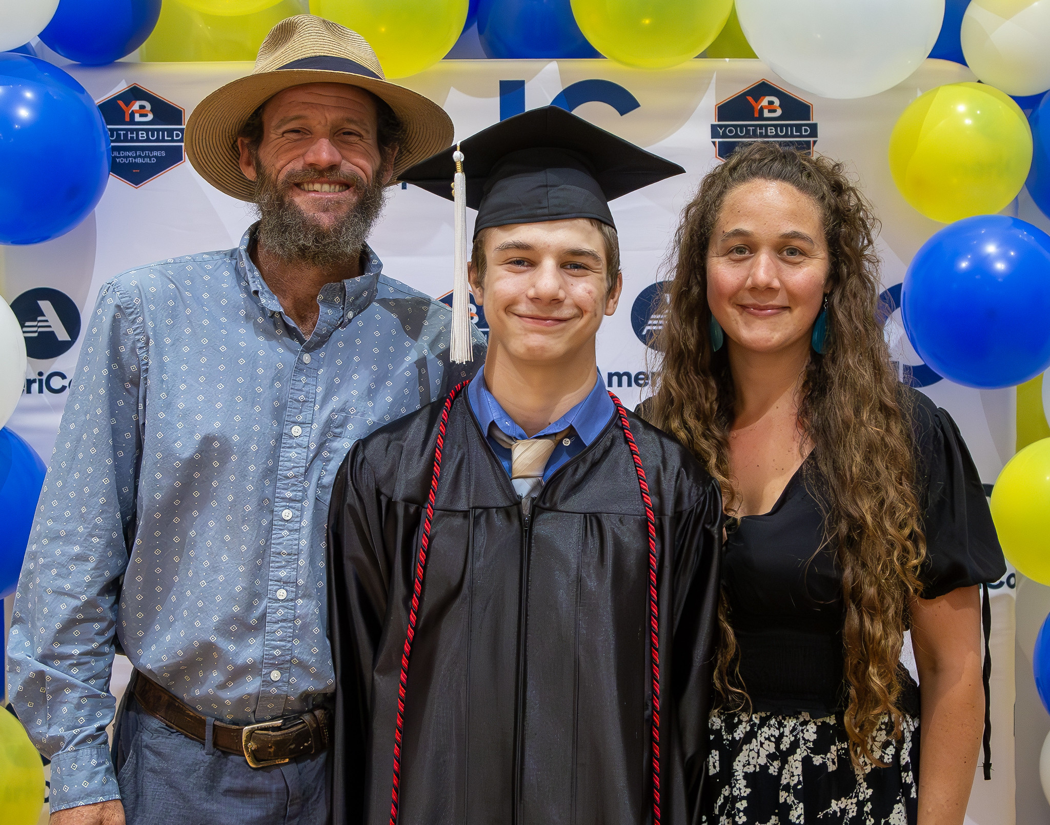 Illinois High School Diploma 2023 Graduate Cayan Moore poses for a photo with his parents, Eric and Crystal Stevens, at last year’s graduation ceremony. JAN DONA/ L&C Marketing & PR