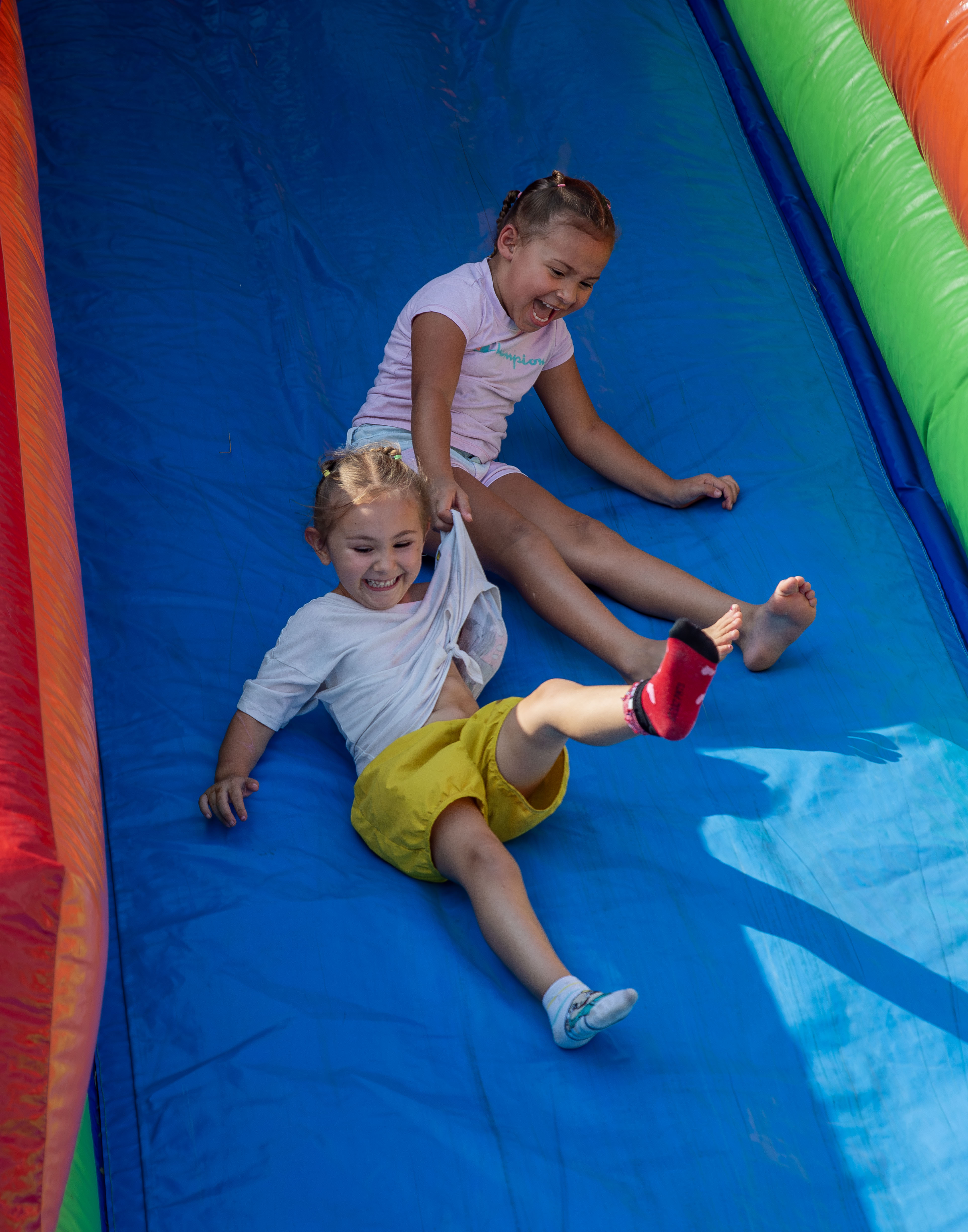 Kids’ activities included inflatables, a climbing tower, face painting, a petting zoo and a coloring table.
