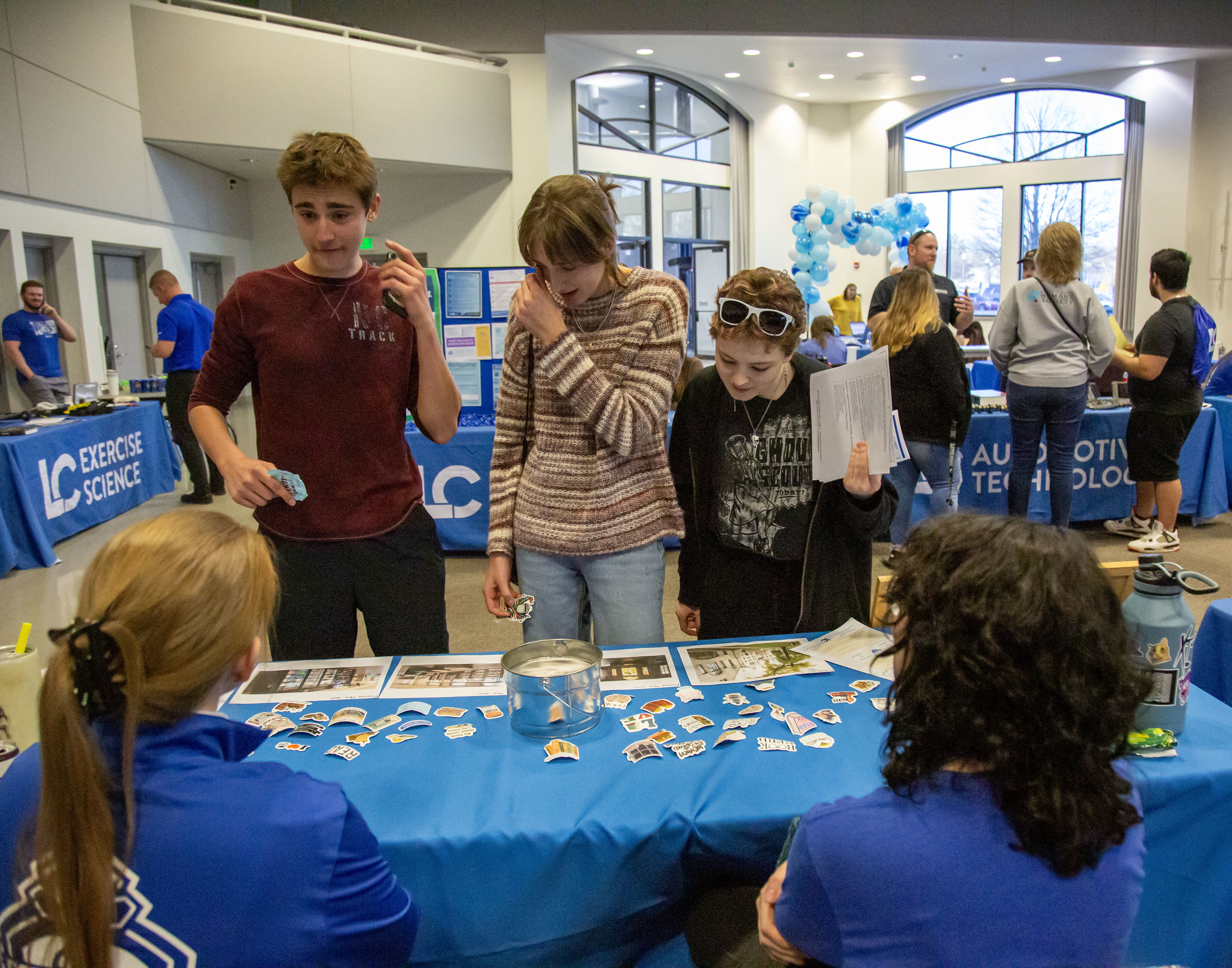 Prospective students visit a table for Reid Memorial Library during the Spring Discover day event in February 2024. JAN DONA/L&C MARKETING & PR