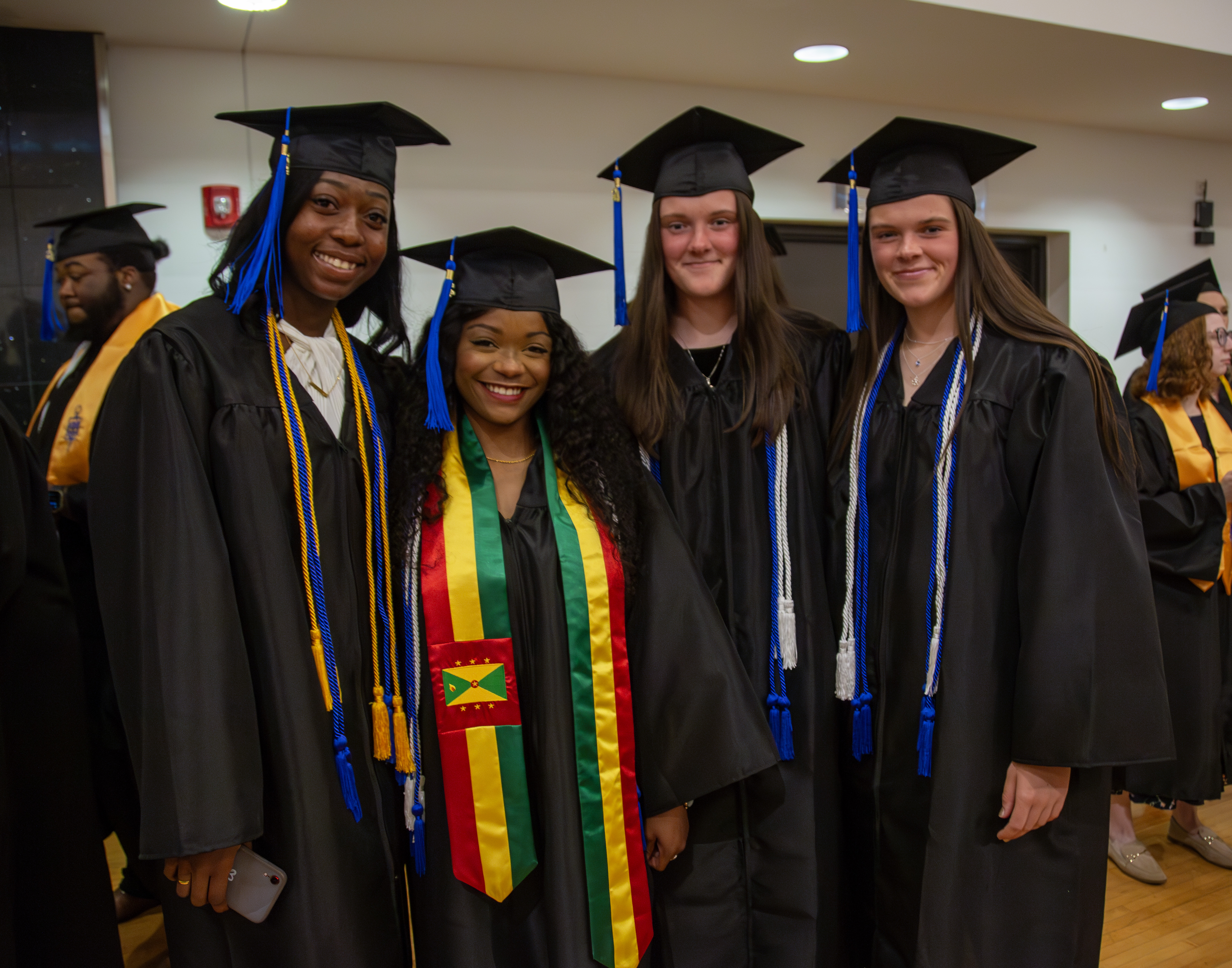 Graduates pose for a group photo before one of Lewis and Clark’s Commencement ceremonies. L&C’s new Human Services degree offers future graduates even more opportunities to find rewarding careers in the Riverbend community and beyond.