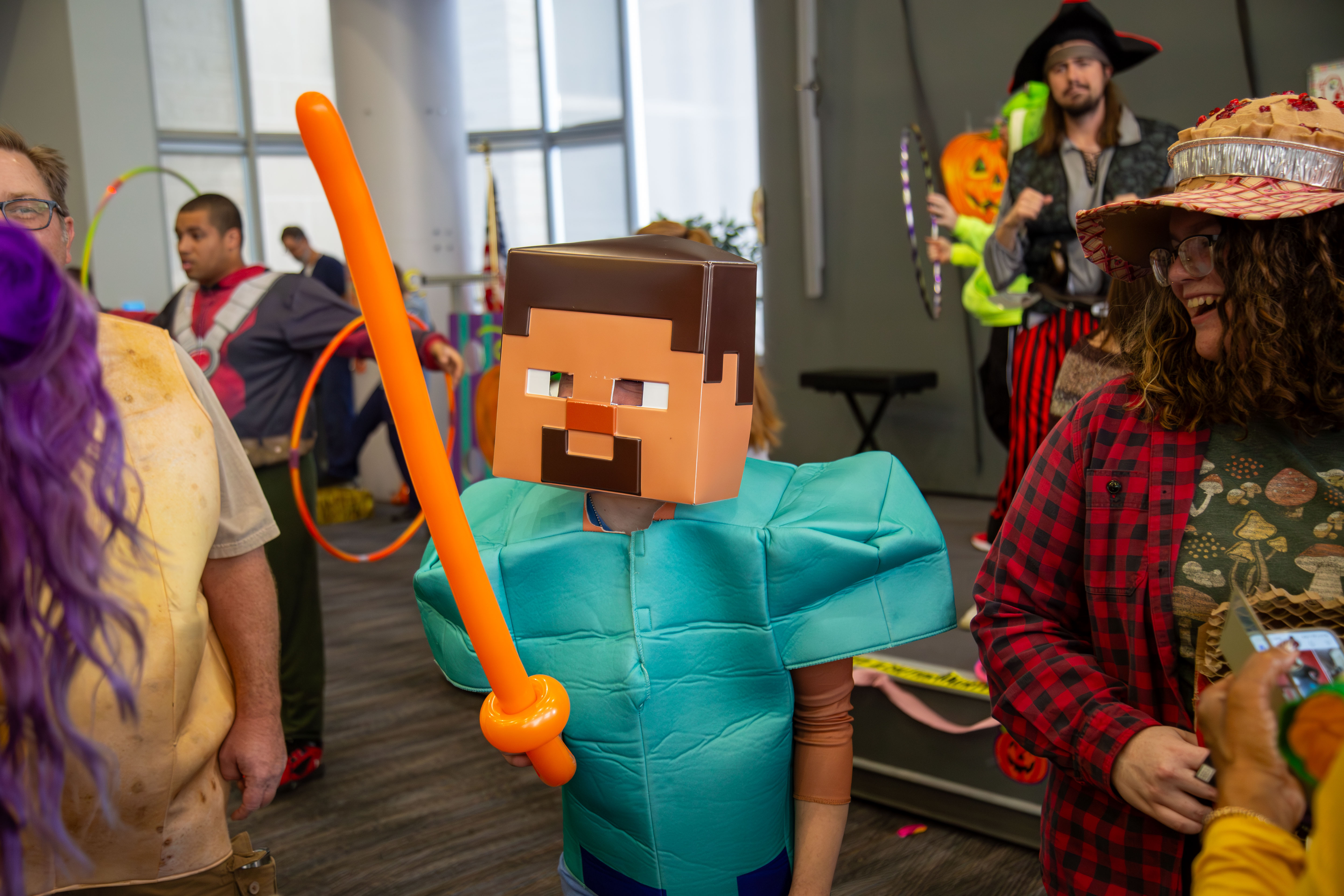 A L&C student enjoys a costume party dressed as Steve from Minecraft.