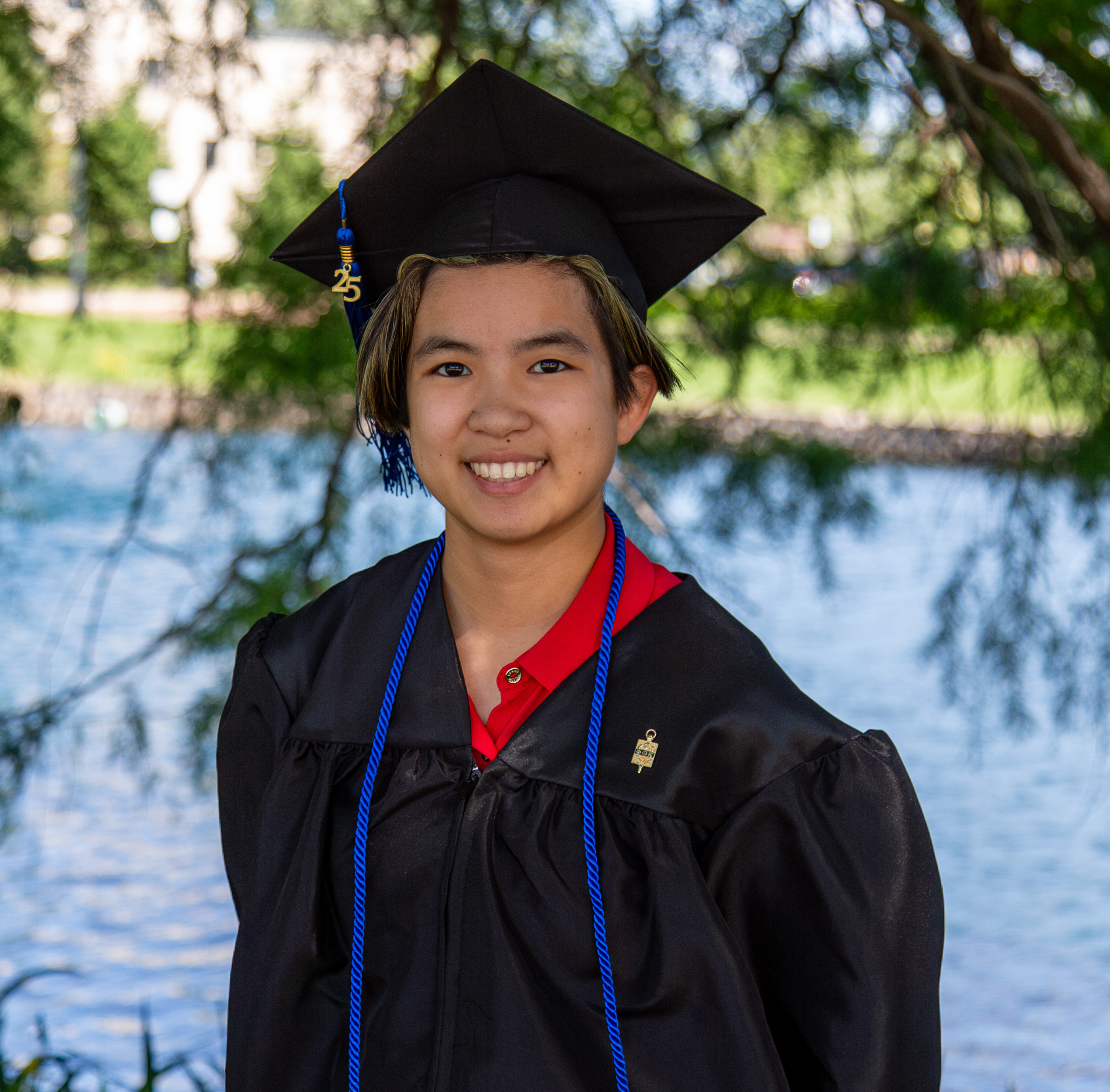 Samantha “Reyez” Hangsleben wearing their L&C commencement attire. Photo and story by JARED SMILACK/MARKETING & PR