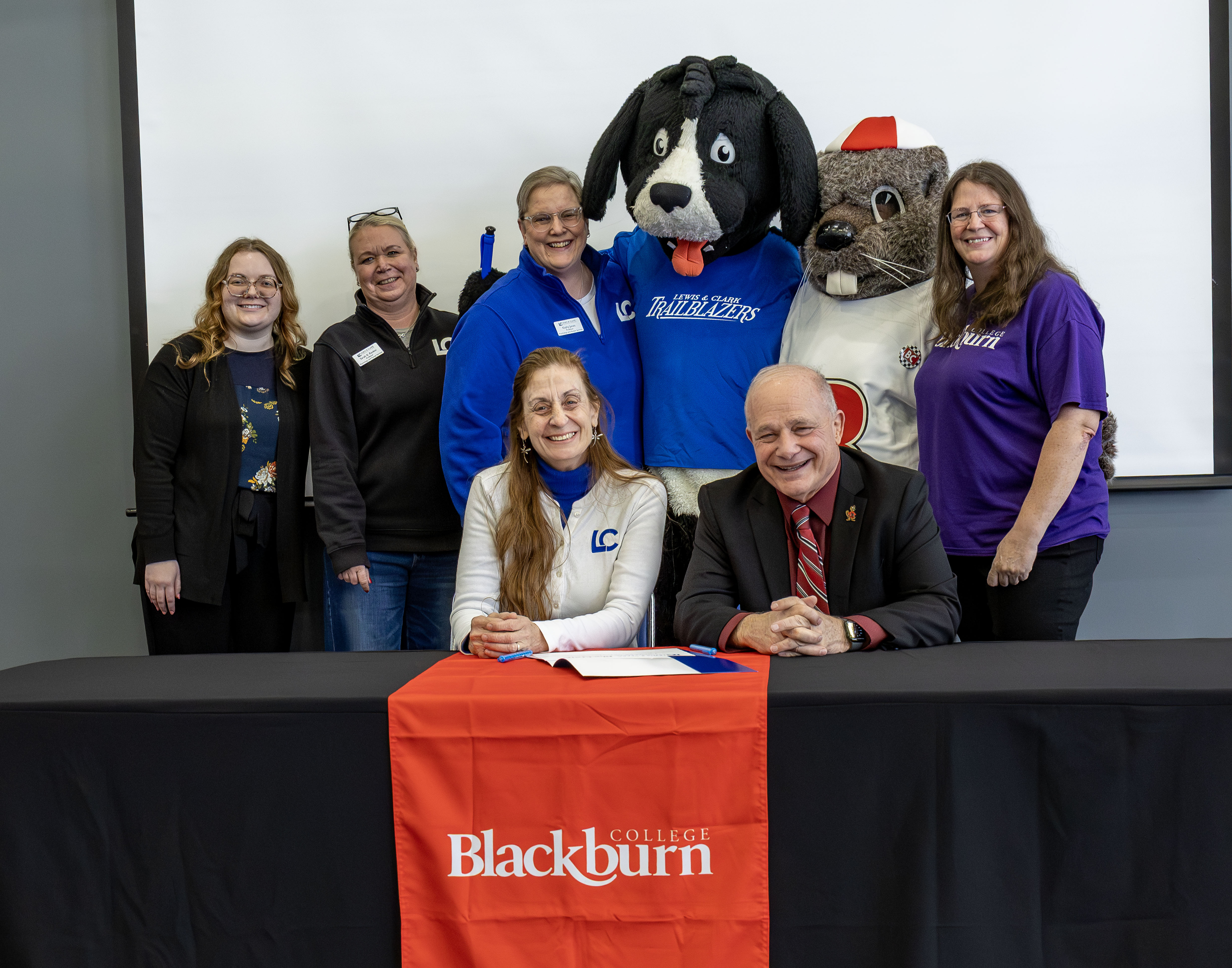 The signing ceremony featured Blackburn College President Larry K. Lee and Lewis and Clark Vice President of Academic Affairs Susan Czerwinski.