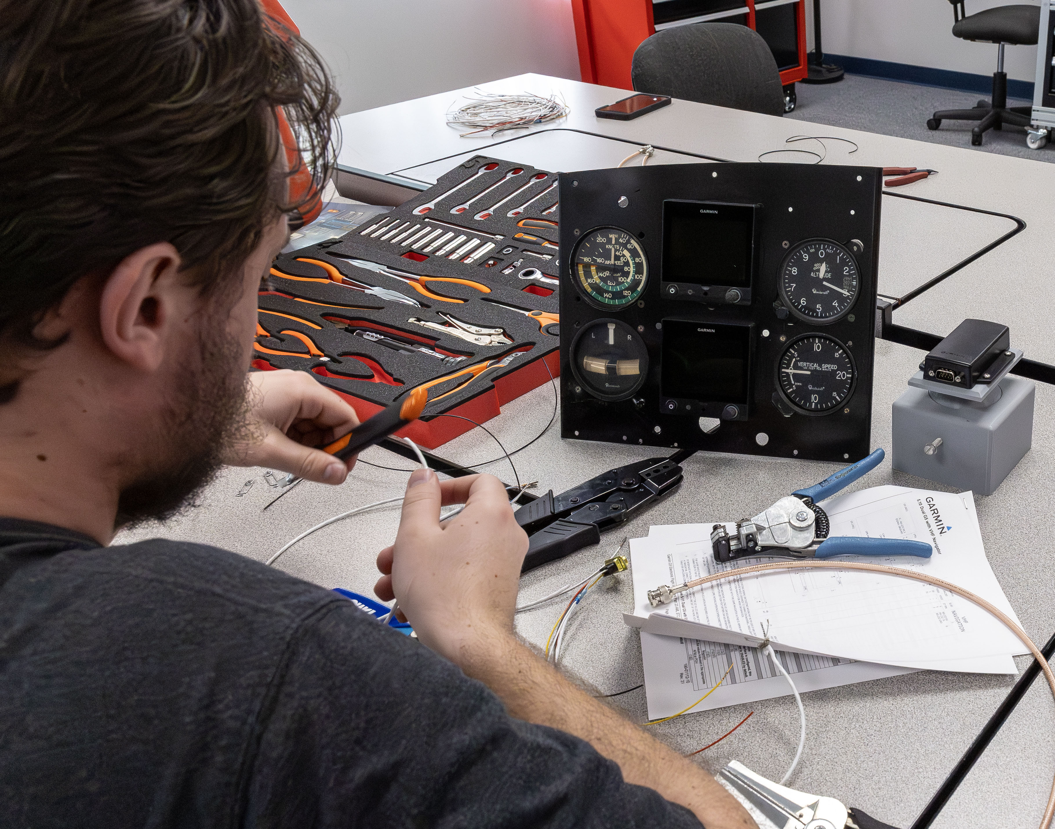 A student works with the new equipment Gulfstream Aerospace recently donated to Lewis and Clark Community College Avionics program. JAN DONA/LC Marketing & PR