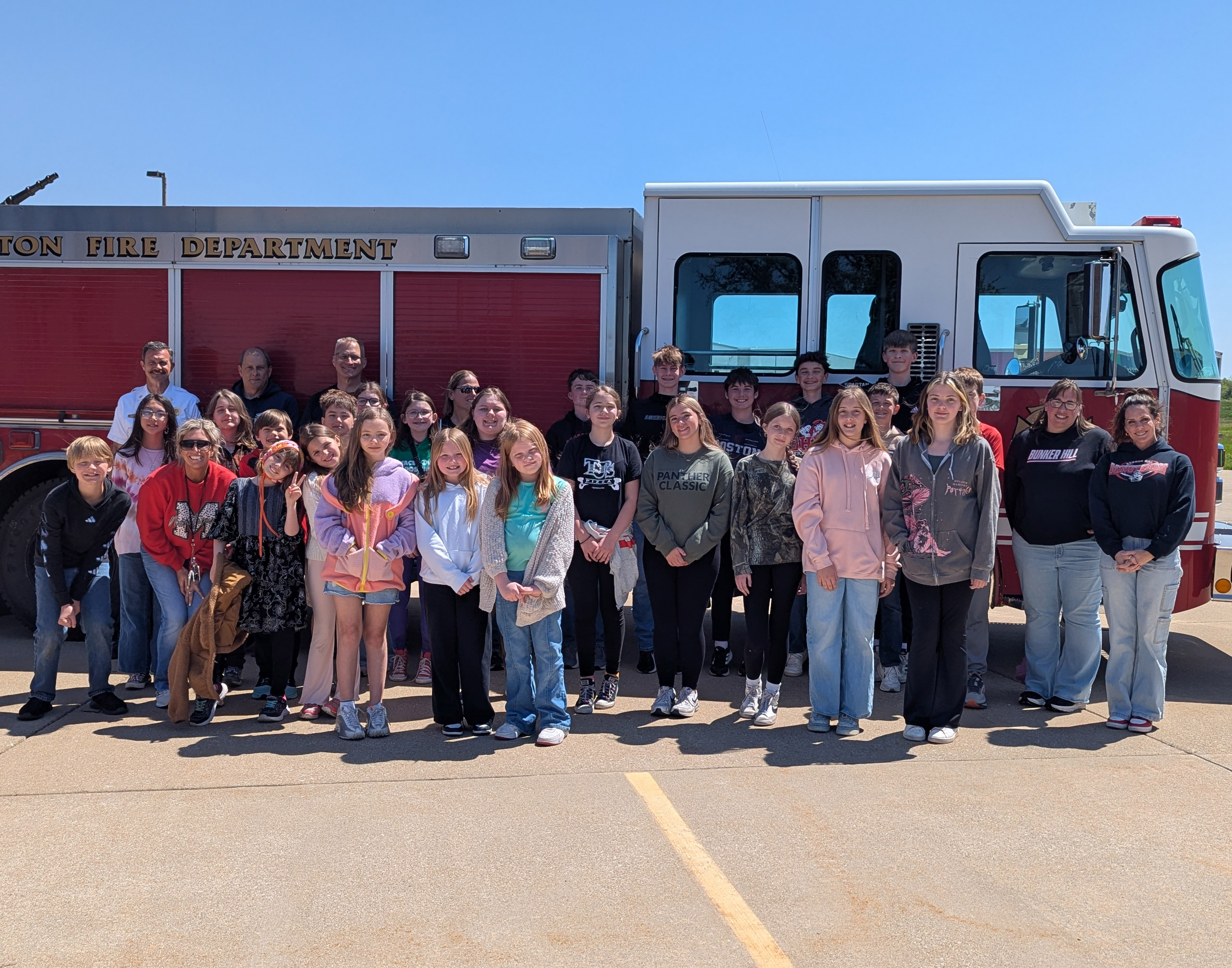 In the front row, from left to right, are Ms. Erin McAfee, Tesla Risdon, Mackenzie Emmerson, Navi Stapleford, Gabi Hamilton and Elvira Christen. In the second row, from left to right, are Wyatt Baker, Rowan Pehrson, Carson Anderson, Madelyn Bertels, Leela Hornbeck, Lydia Timmermeier, Adelynn Bartee, Aubrey Guess, Ariana Banwart, Kaylee Wall, Mrs. Tricia Banwart and Mrs. Shadow Collins. In the third row, from left to right, are Edwardsville Asst. Fire Chief Mark Mayfield, Bunker Hill Firefighter Bob Yaeger, LC Fire Science Coordinator Ed Burnley, Ms. Katie Sutton, Ryker Henfling, Jackob Wall, Logan Pollard, Cooper Kahl and Carson Trimm. PHOTO BY KELLY REMIJAN