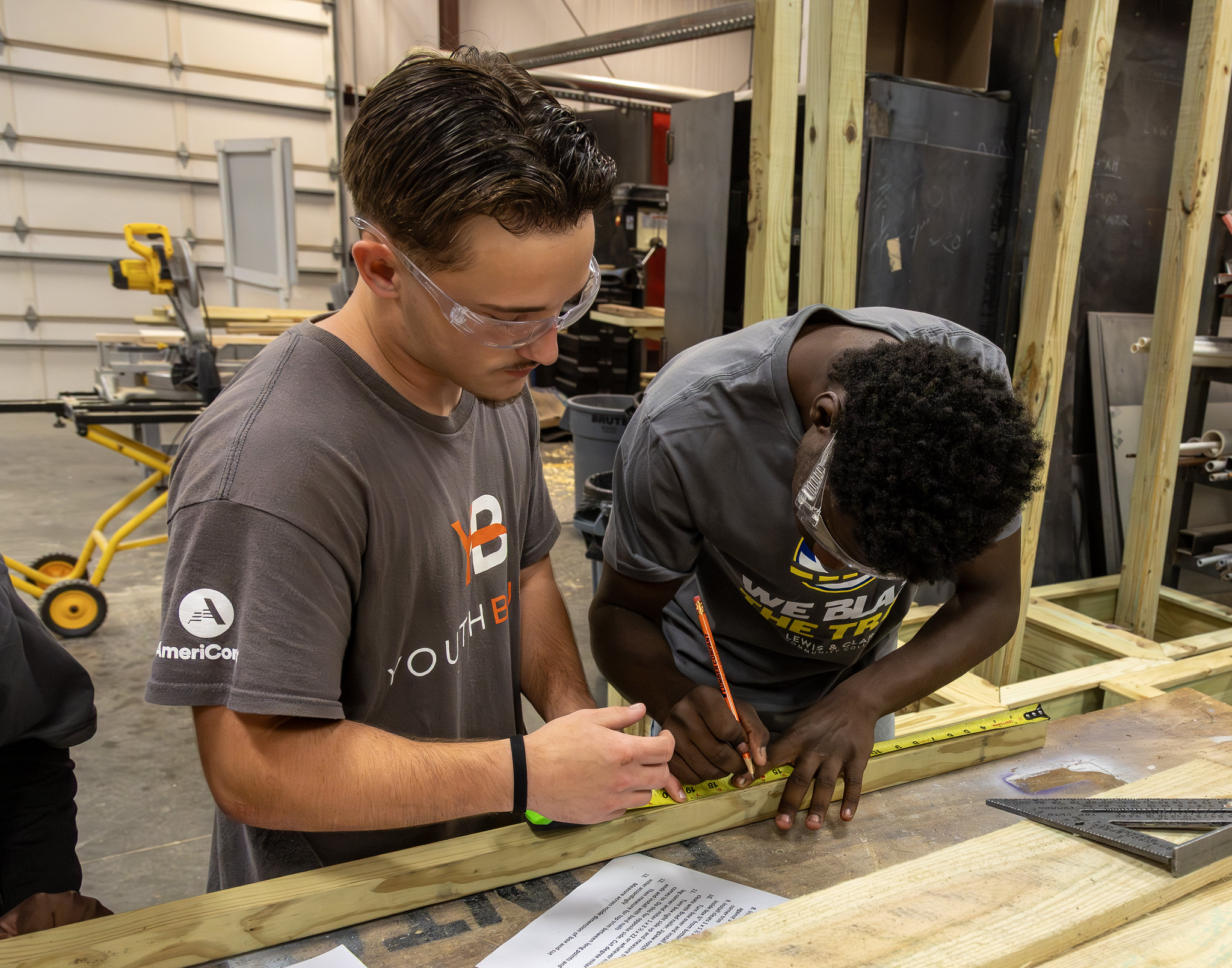 YouthBuild Leader Landen Clark (left) assists Carleione Pittman June 10 during the 2026 YouthBuild Construction Camp. Photo by Jan Dona, LC Marketing/PR.