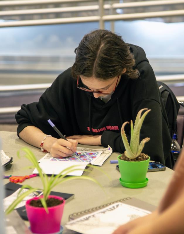 A student stops to color at the 2025 Resource and Wellness Fair at Lewis and Clark Community College. LAURA INLOW/LC Marketing & PR